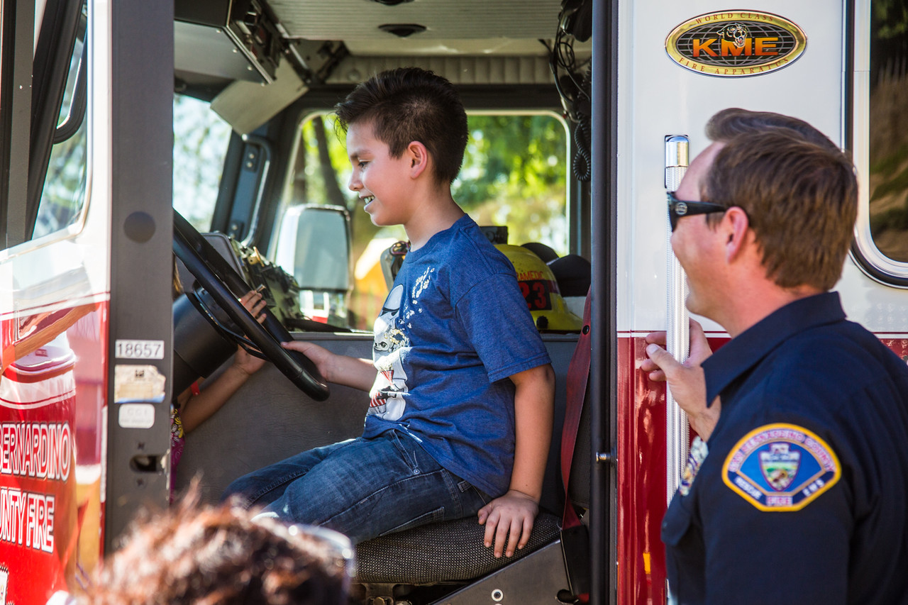 Boy in Fire Truck driver seat